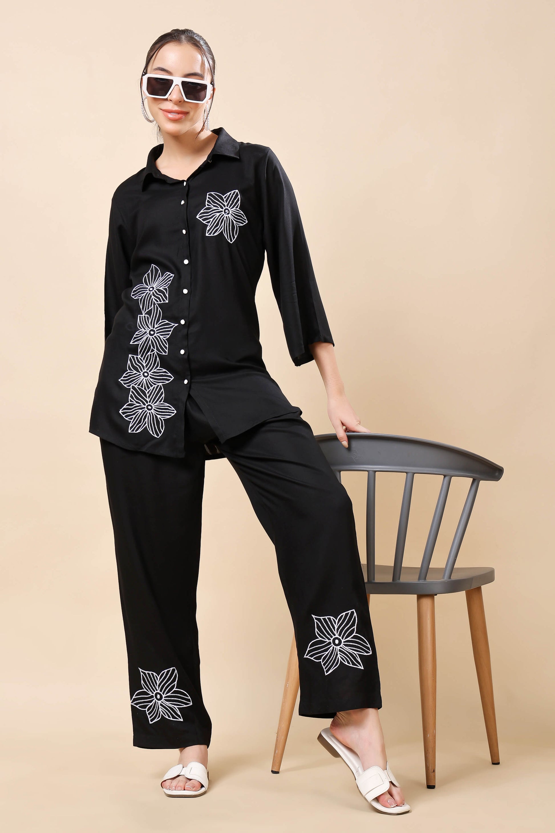 Model wearing Rabric black floral embroidered co-ord set for women