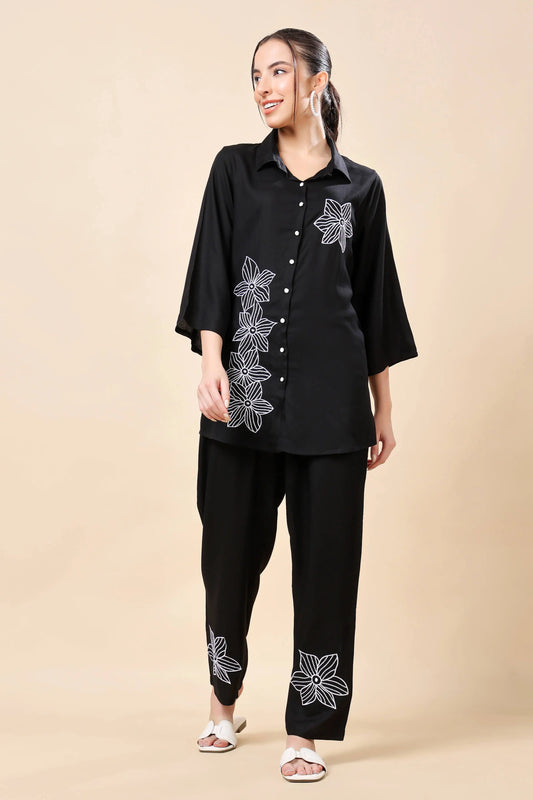 Front view of Rabric premium rayon black floral embroidered co-ord set for women