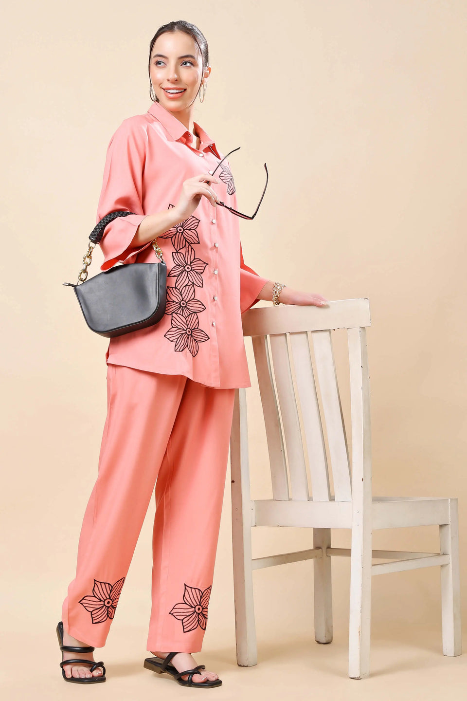 Model wearing Rabric peach floral co-ord set