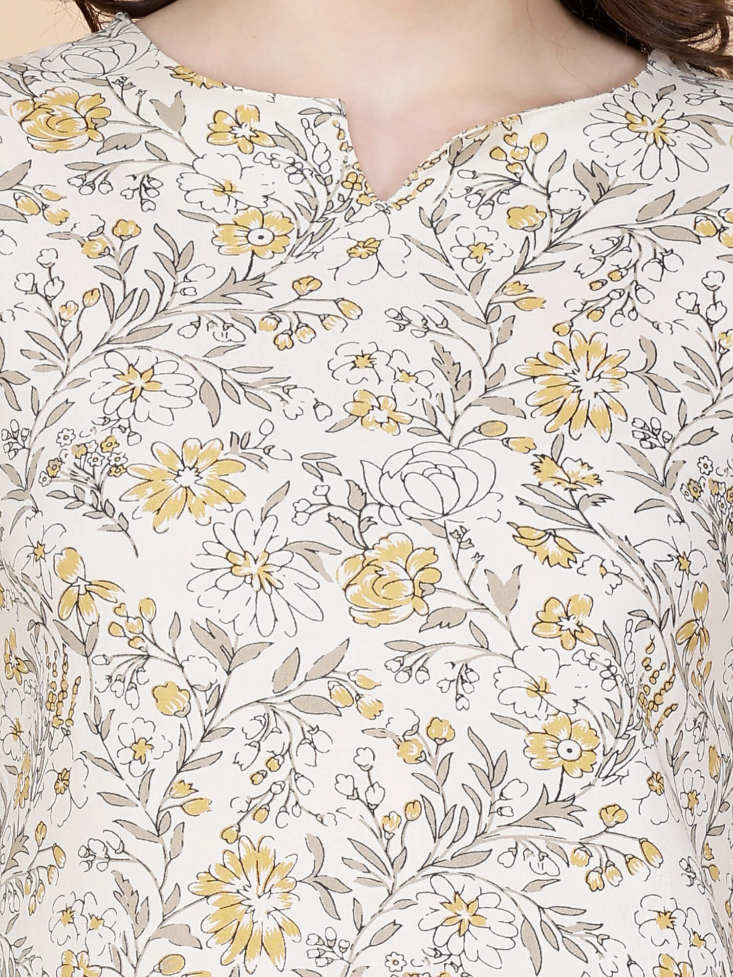 Close-up of floral rayon fabric and stitching details