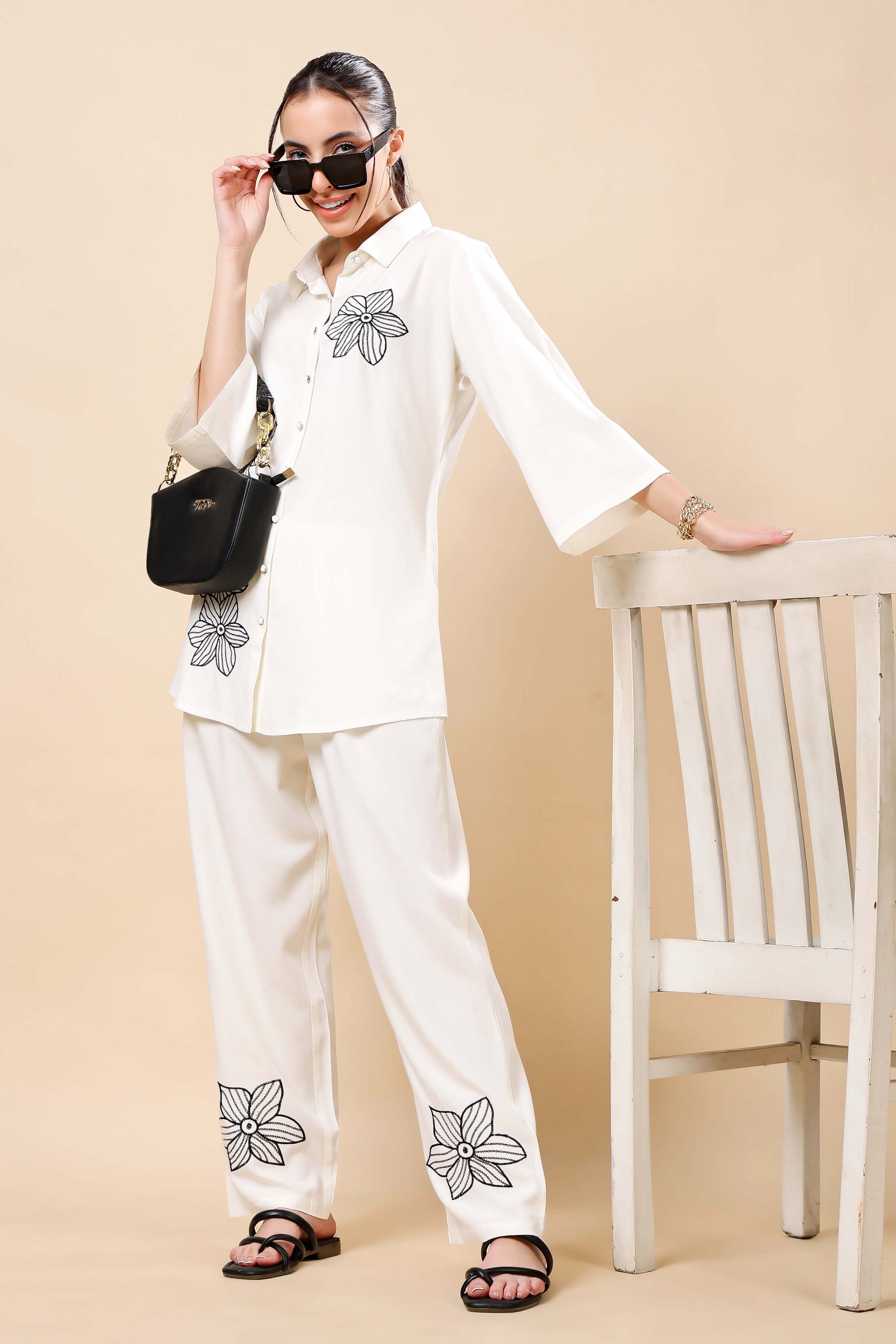 Model wearing Rabric white floral embroidered co-ord set