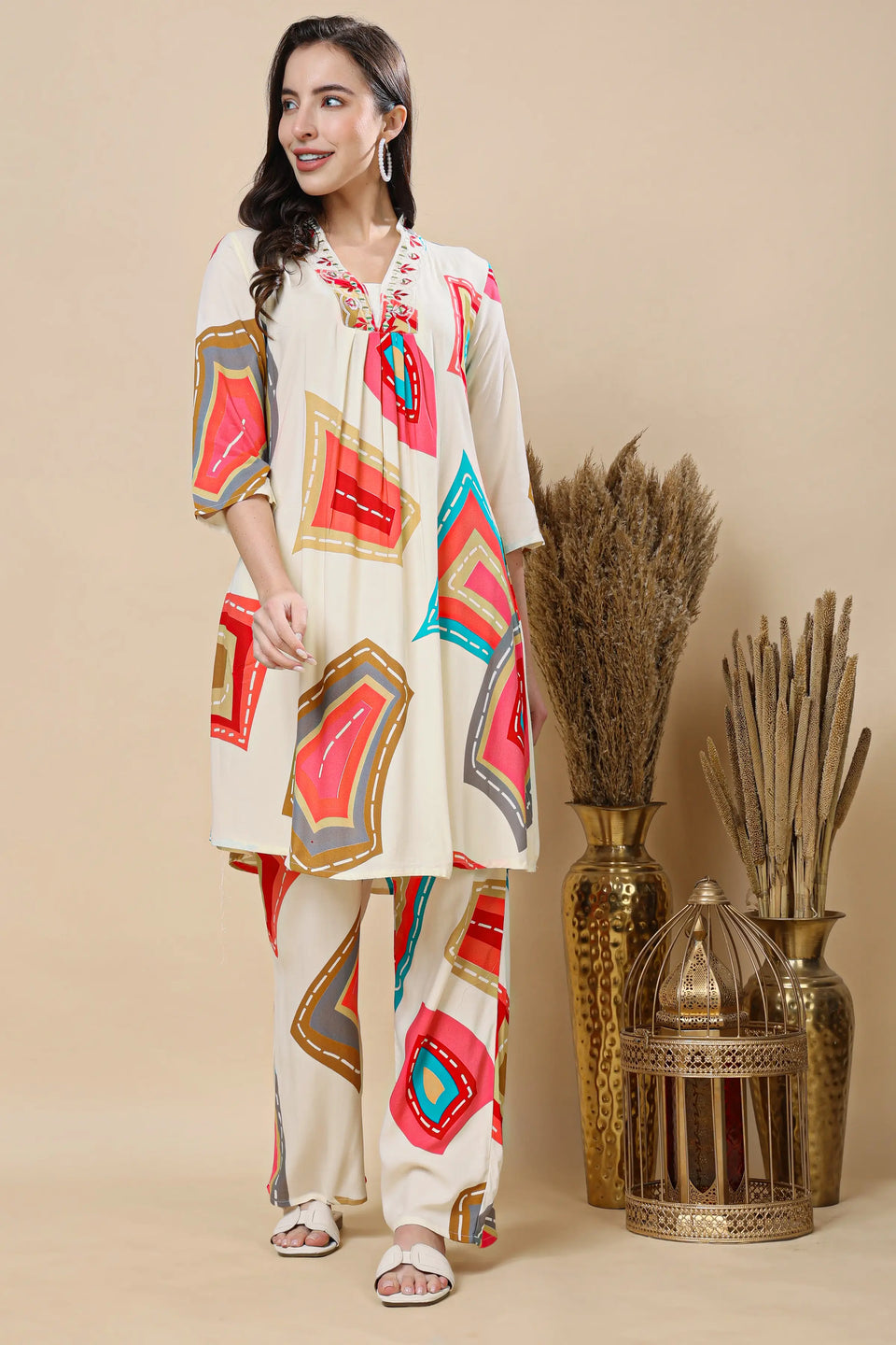 Embroidery and print detail on premium cotton kurti set with geometric design
