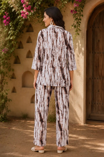 Back view of Rabric brown white rayon co-ord set for women featuring abstract reptile inspired print short shirt and relaxed fit pants