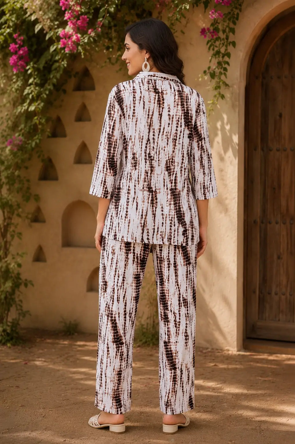 Back view of Rabric brown white rayon co-ord set for women featuring abstract reptile inspired print short shirt and relaxed fit pants