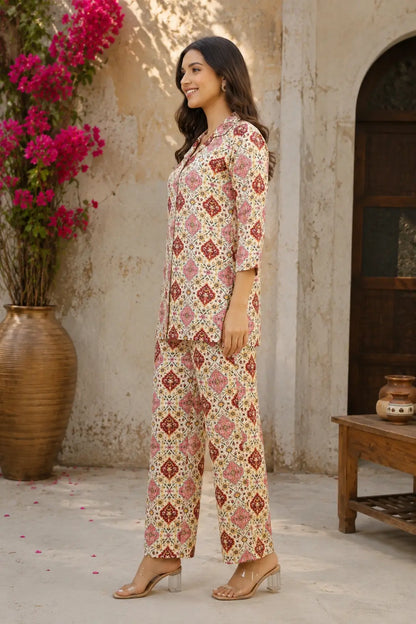 Side angle of women rayon floral printed co-ord set in cream pink ethnic print by Rabric