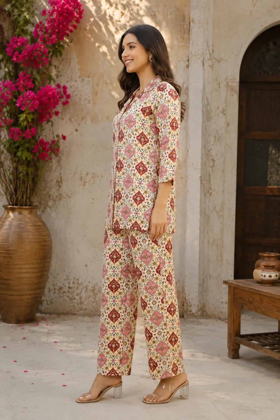 Side angle of women rayon floral printed co-ord set in cream pink ethnic print by Rabric