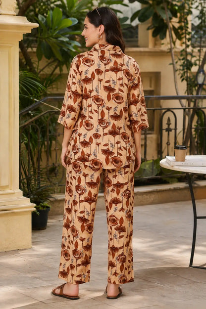 Back view of Rabric beige brown floral printed rayon co-ord set featuring 3-4 sleeve short shirt and straight fit pants