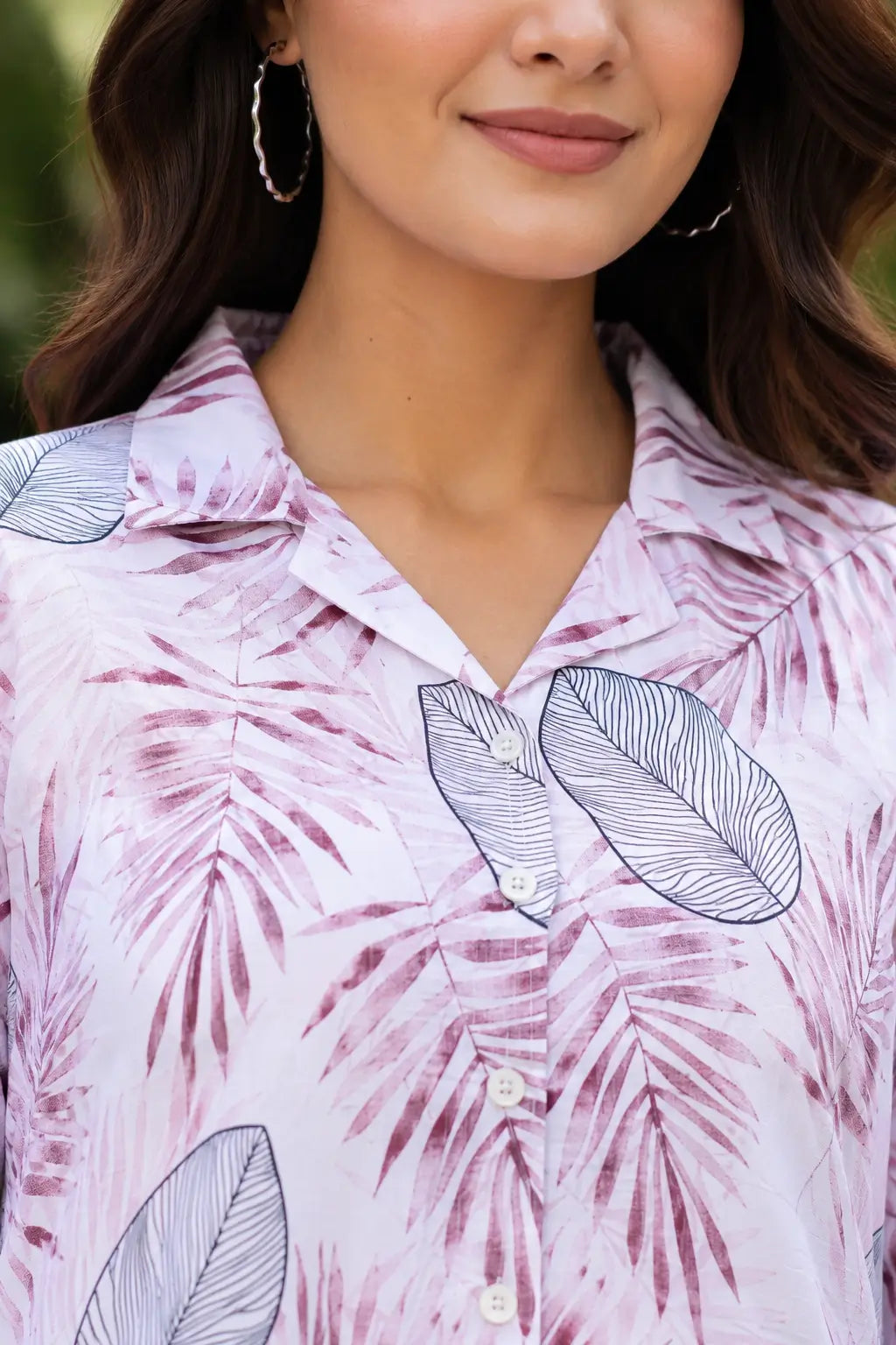 Close up neck design of Rabric pink rayon co-ord set shirt with collar neck, tropical leaf print and soft breathable fabric texture