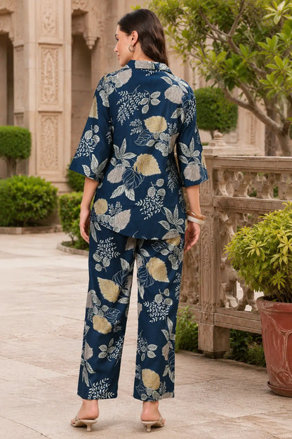 Back view of Rabric navy blue rayon leaf print co-ord set for women with relaxed fit shirt and pants