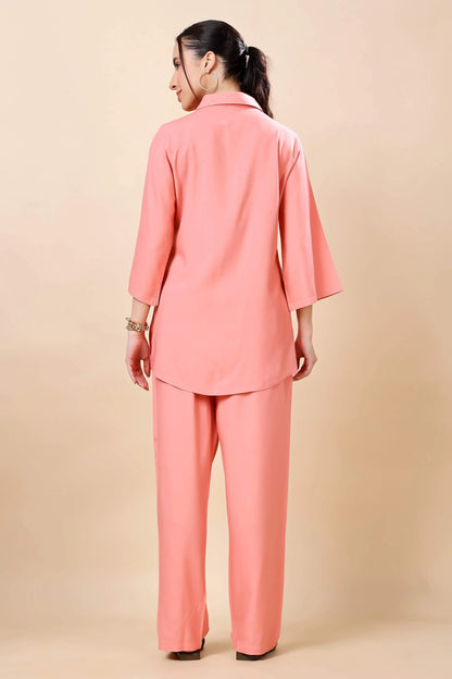 Back view of Rabric peach co-ord set with relaxed trousers