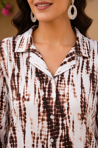 Close up neck design of Rabric women rayon co-ord set with collar neck and brown white abstract snake print detailing