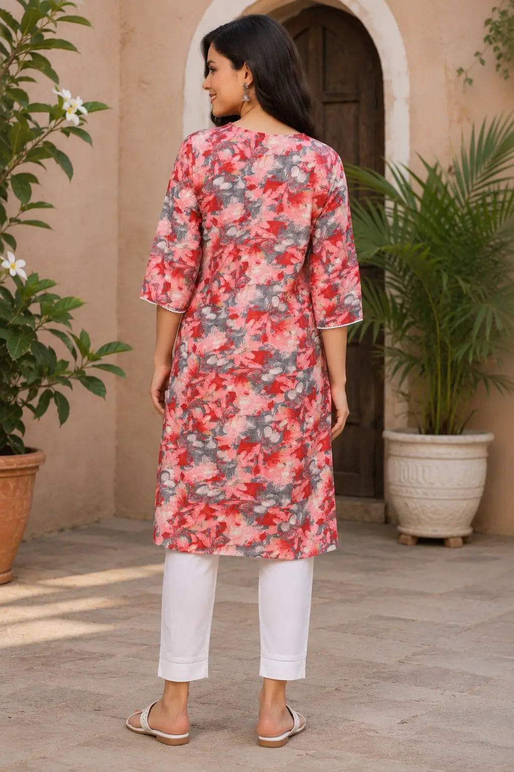 Back side view of Rabric red pink floral cotton kurti for women with straight fit design and comfortable mid length style