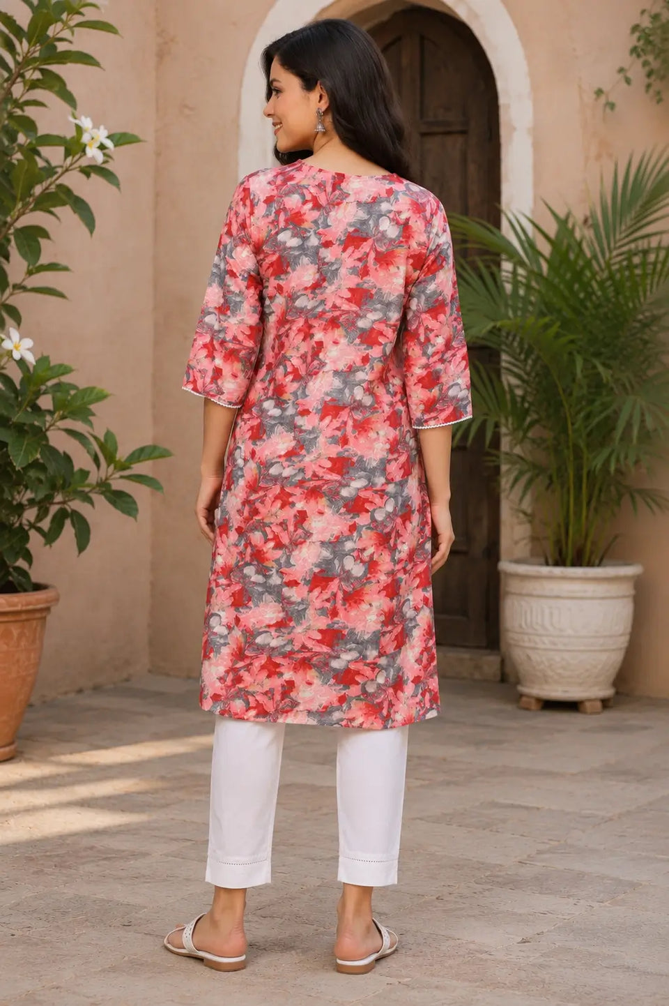 Back side view of Rabric red pink floral cotton kurti for women with straight fit design and comfortable mid length style