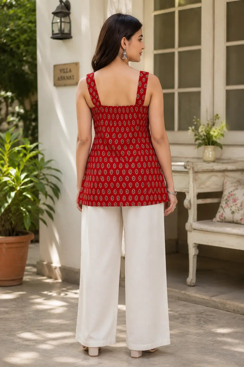 Back view of Rabric red printed cotton sleeveless short top for women with comfortable relaxed fit and traditional paisley print design.