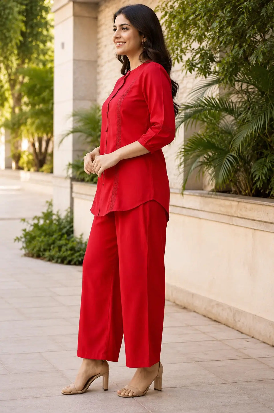 Side angle of Rabric red Vertican Silk co-ord set for women featuring elegant lace detailing, premium fabric texture and relaxed fit silhouette.