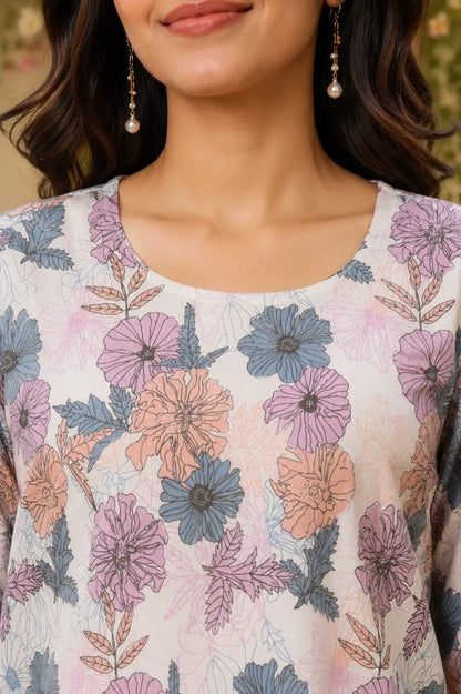 Close-up detail of RABRIC round neck floral printed women’s top fabric and design