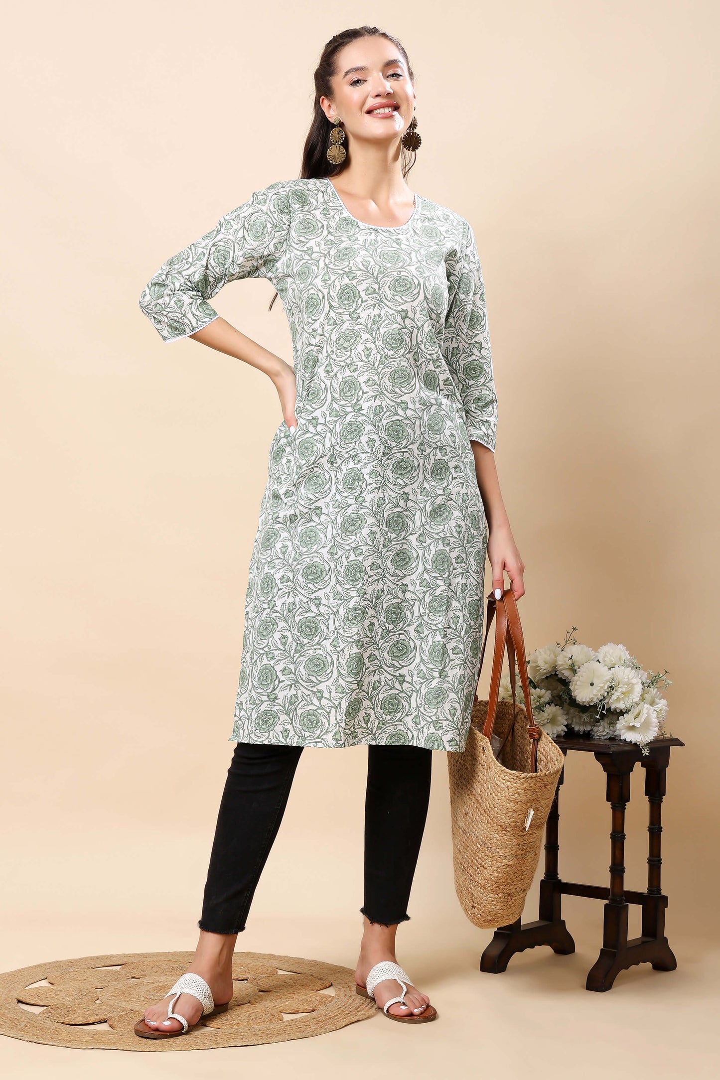 Close-up of round neck with lace detailing on Rabric floral kurti