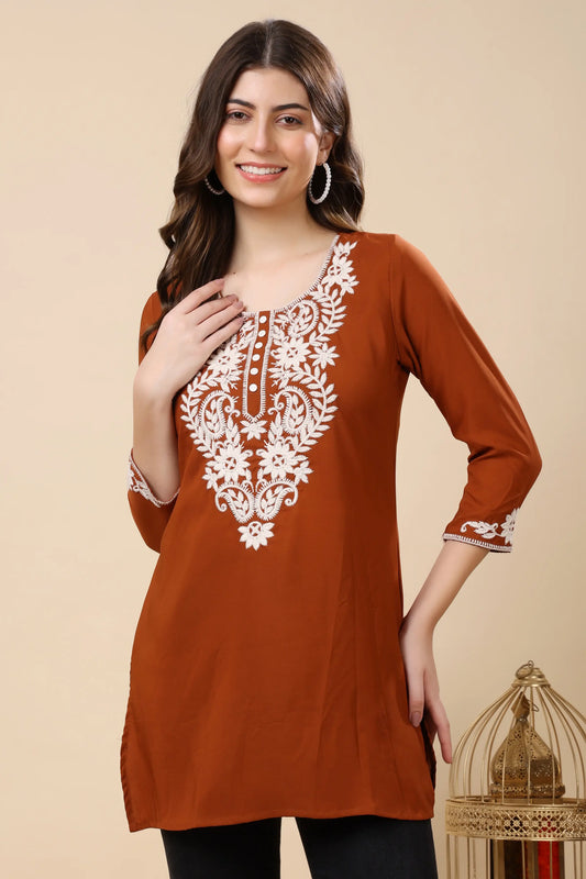 Rabric rust brown crepe short kurti for women with white embroidery front view