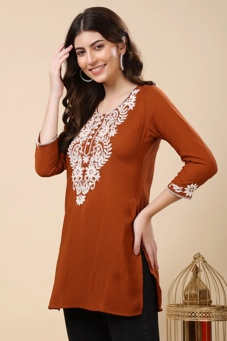 Side view of Rabric designer short kurti for jeans in rust brown crepe fabric