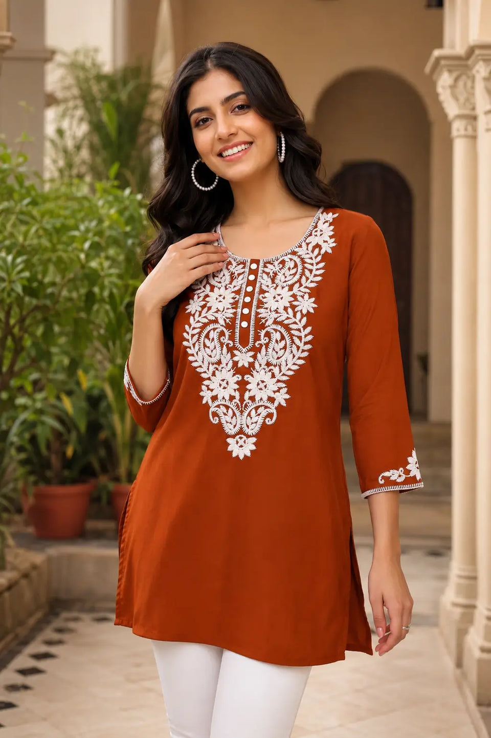 Rabric women rust cotton embroidered short kurti front view with white thread embroidery and 3/4 sleeves