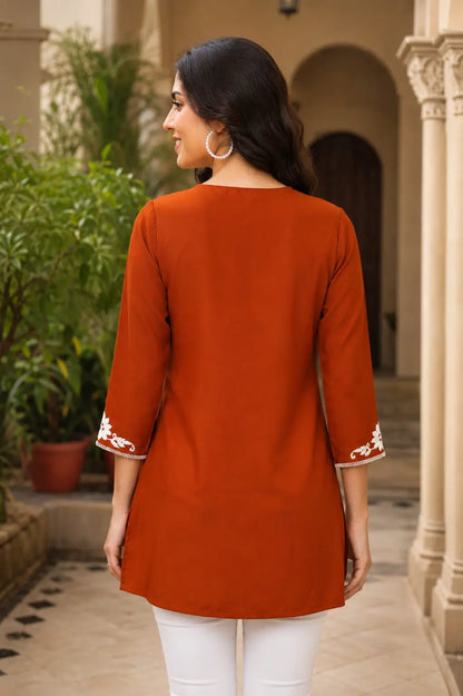 Back side view of Rabric rust cotton short kurti for women with elegant straight fit and 3/4 sleeves