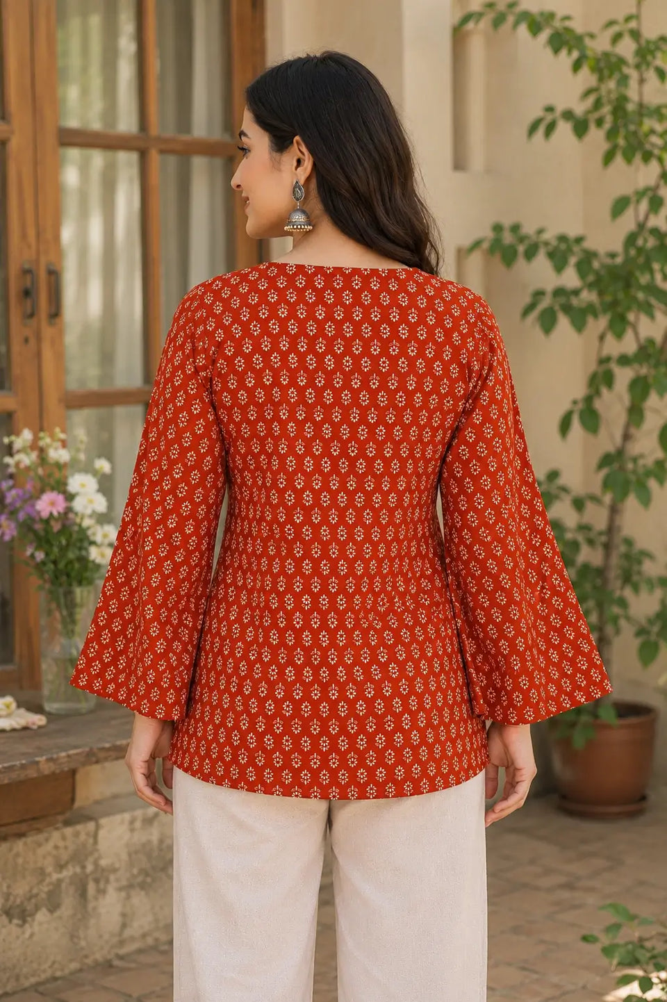 Rabric rust red cotton floral print short top for women back view with full belly sleeves and hip length fit