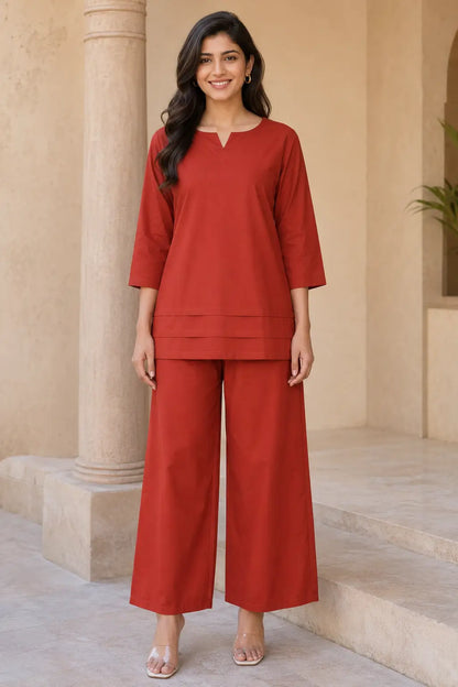 Rabric rust red cotton plain co-ord set lifestyle look for women with sunglasses and casual accessories