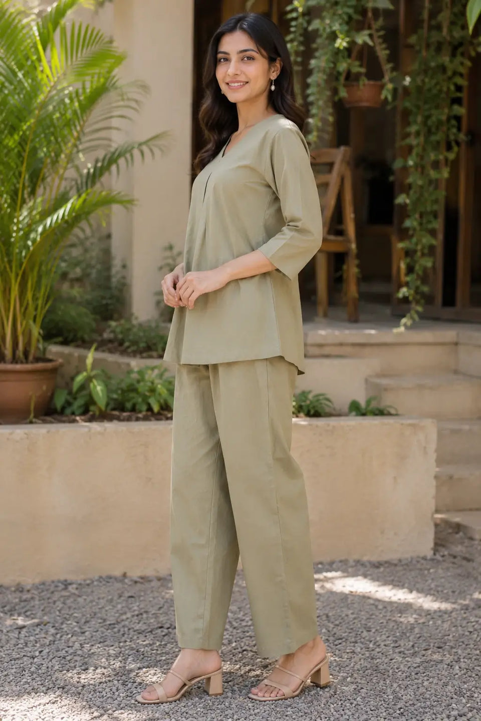 Side view of Rabric sage green cotton co-ord set featuring short V-neck kurti and comfortable wide pajama