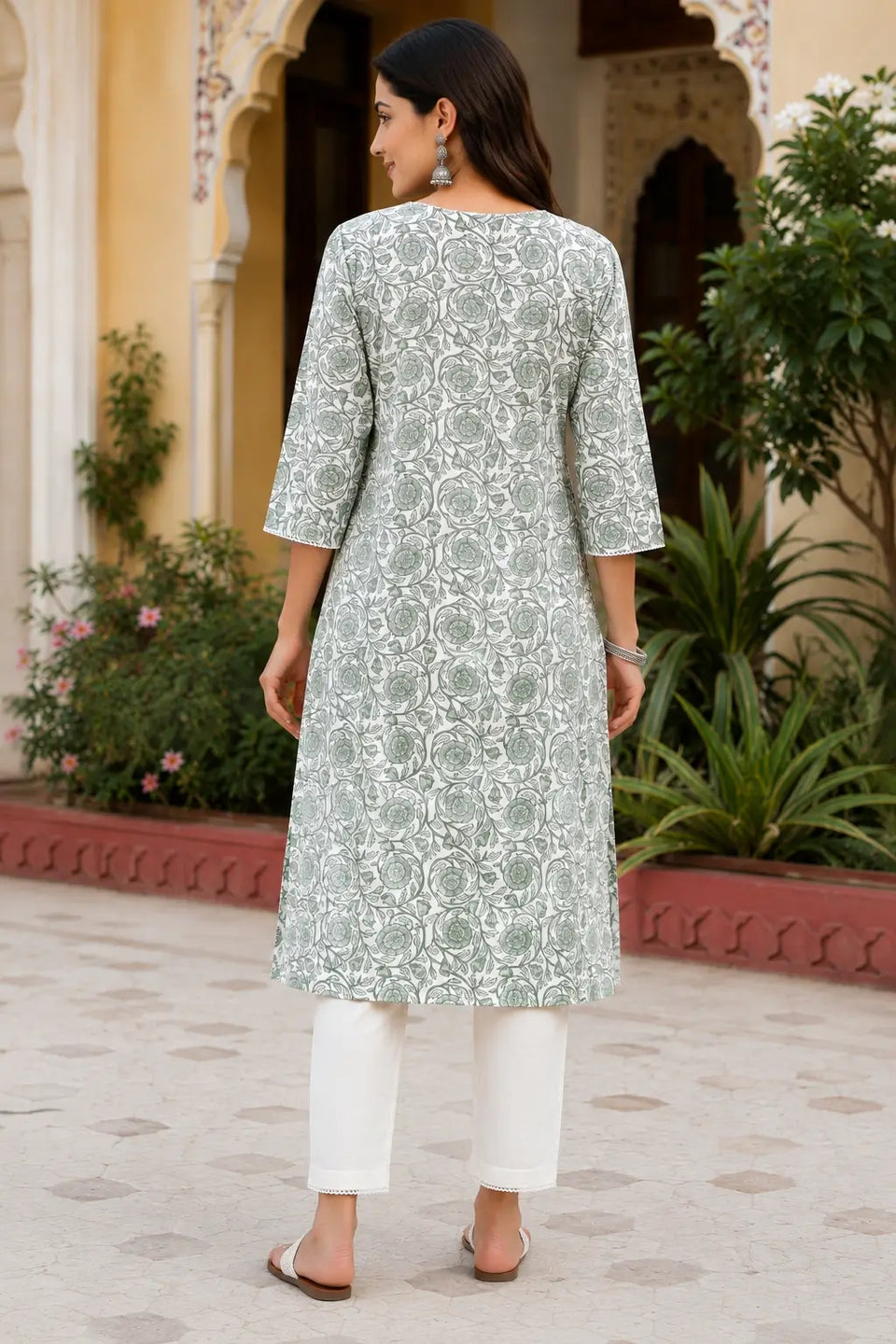 Back view of Rabric sage green cotton floral printed straight women kurti with elegant ethnic design