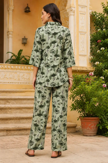 Back view of Rabric sage green rayon botanical print co-ord set for women with relaxed fit shirt and matching pants