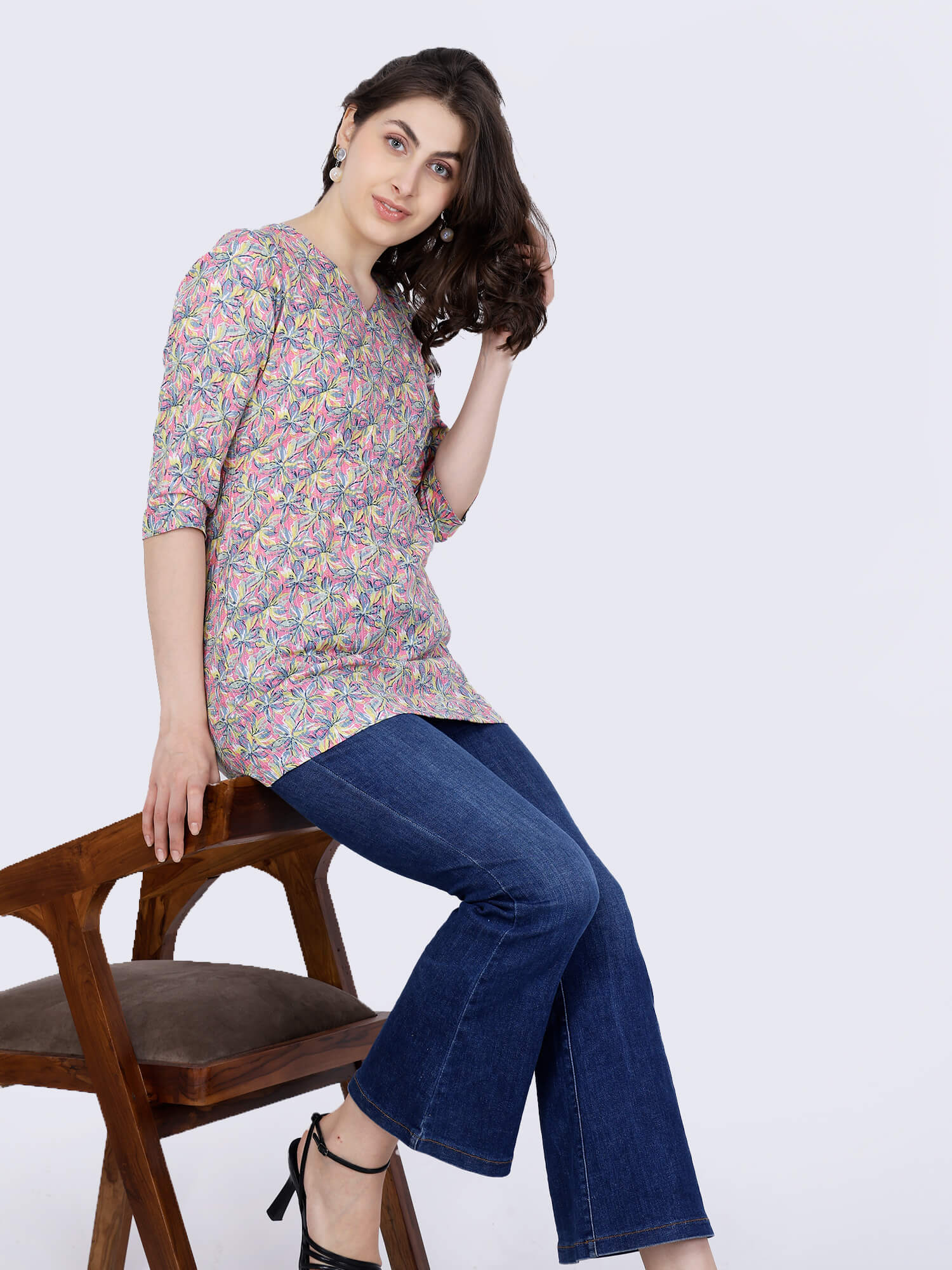 Pink yellow short kurti paired with jeans – Rabric collection