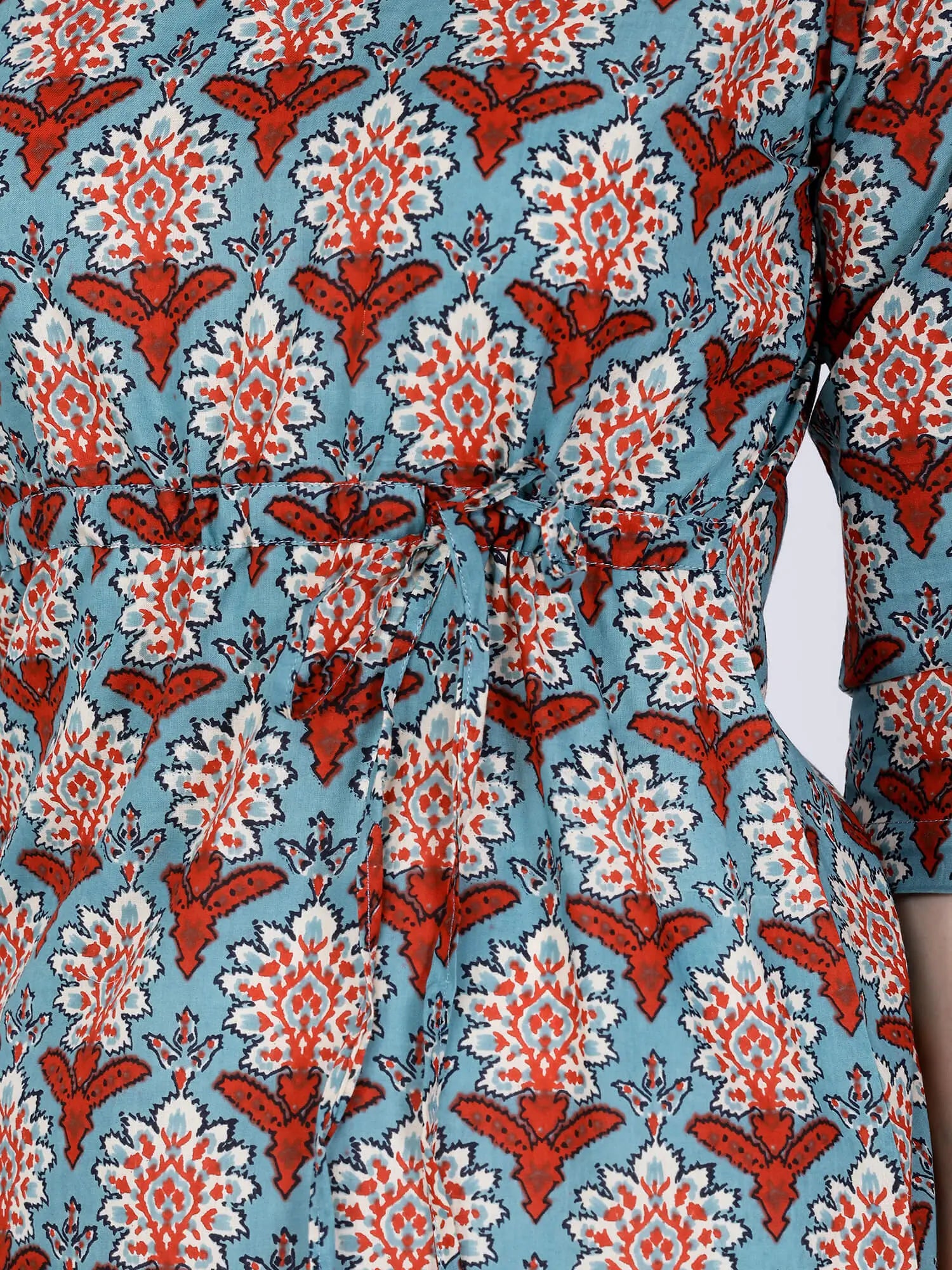 Close-up of V-neck design on Premium Red & Blue Short Kurti