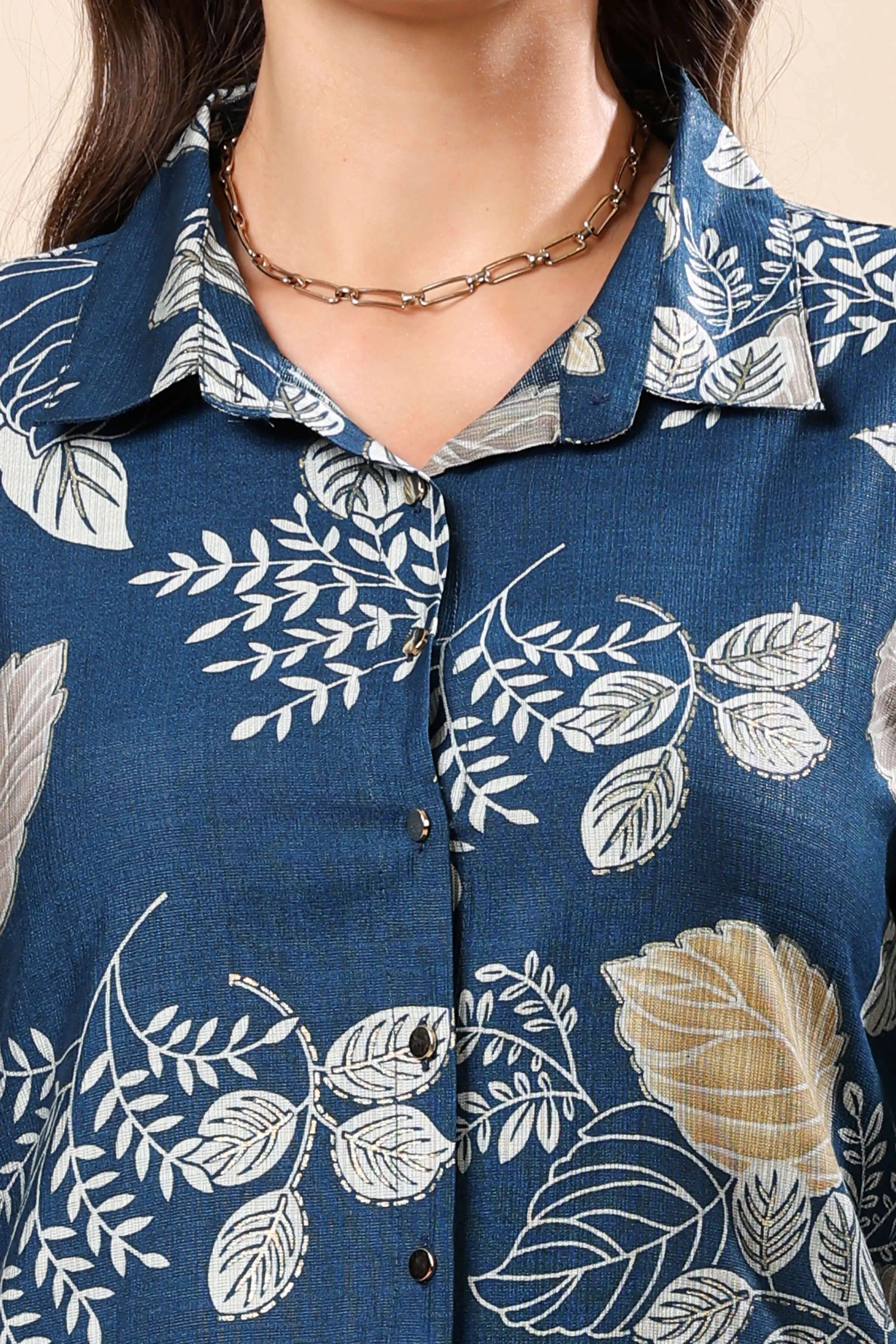 Close-up of golden button detailing on Rabric premium co-ord set top