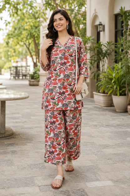 Beautiful Indian model wearing Rabric soft pink cotton floral printed co-ord set with wide leg palazzo pants for casual daily wear and comfortable summer styling