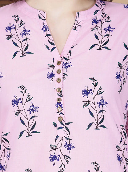 Close-up of floral handblock-inspired print on pink kurti