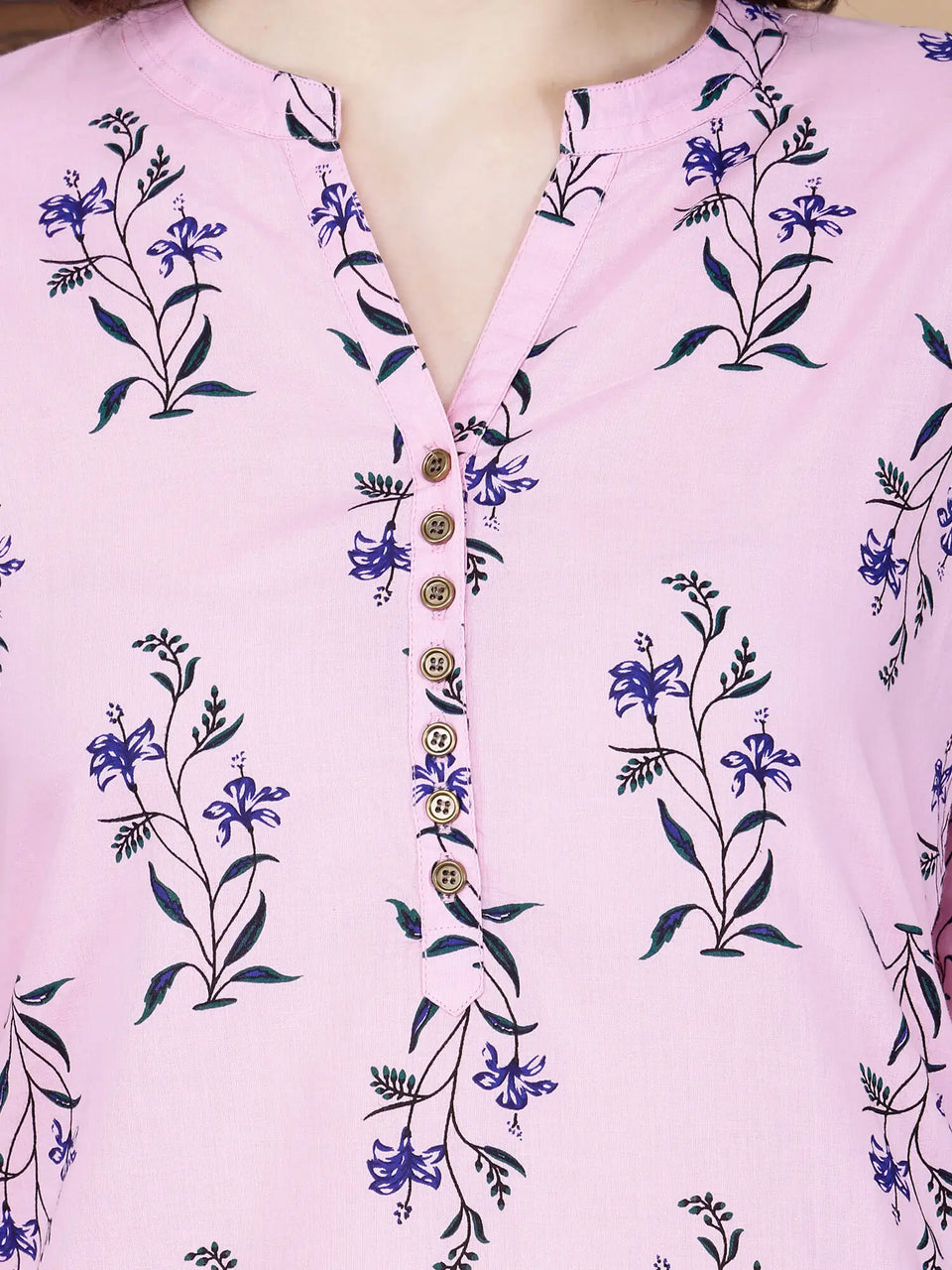 Close-up of floral handblock-inspired print on pink kurti