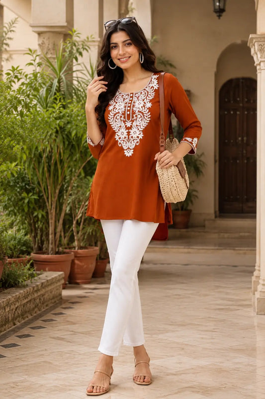 Stylish women cotton short kurti with white trousers and casual accessories by Rabric