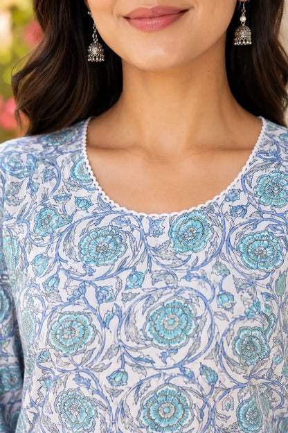 Close up stylish round neck design of Rabric blue floral cotton women kurti with elegant detailing