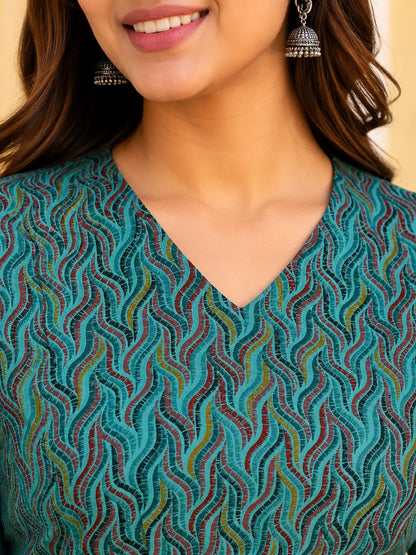 Close up V neck design zoom of Rabric teal blue cotton printed women short top with premium stitching and stylish neckline