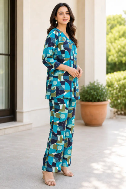 Rabric teal navy olive cotton co ord set for women with V neck tunic, 3/4 sleeves and wide leg pants side view