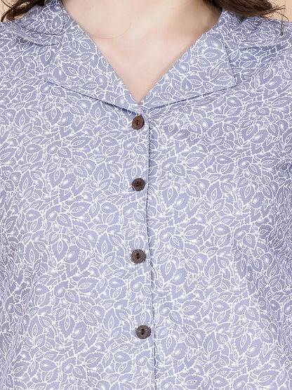 Close-up of glace cotton printed fabric and buttons