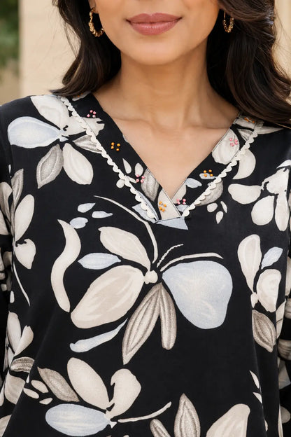 Close-up view of Rabric women's black floral print cotton co-ord set featuring elegant V-neck design with decorative detailing