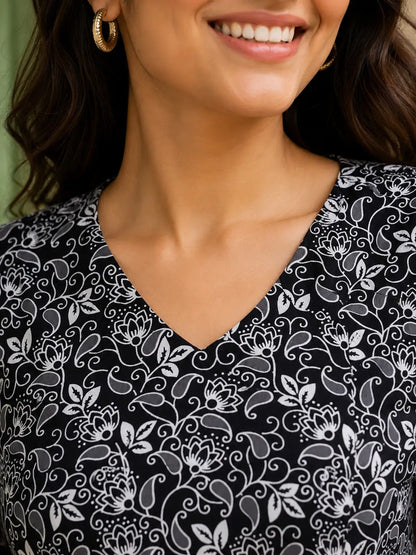 Closeup V neck design of Rabric black white cotton cambric floral short top for women premium casual wear