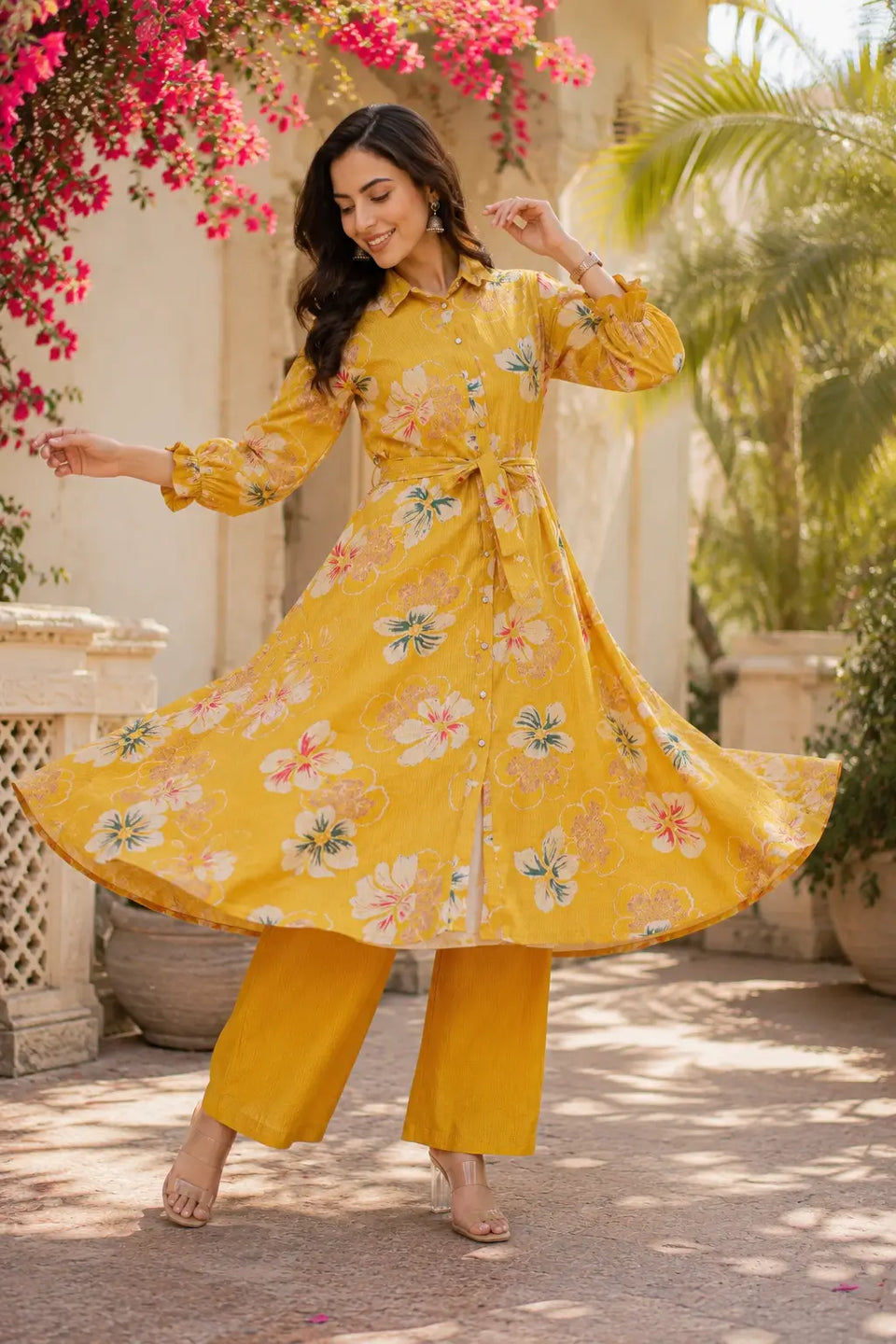 Full flair twirl shot of Rabric vertical silk floral long kurta co-ord set
