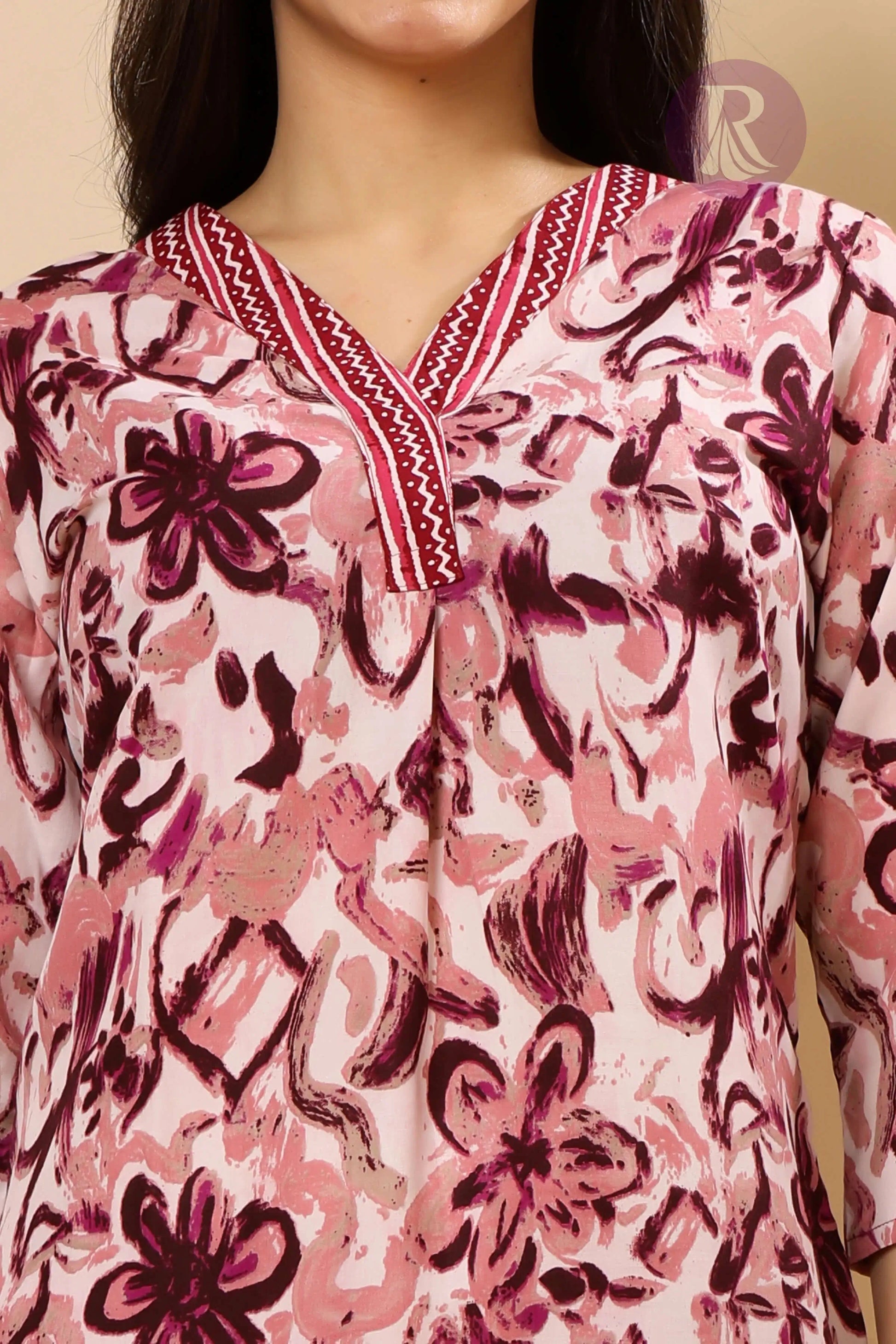 Close-up of V-neck thread work on Rabric cotton slub floral printed kurti for women