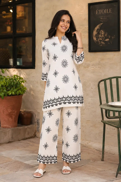 Rabric white and black Vertican Silk floral printed women co-ord set front view with straight kurti and wide leg pants for stylish casual wear