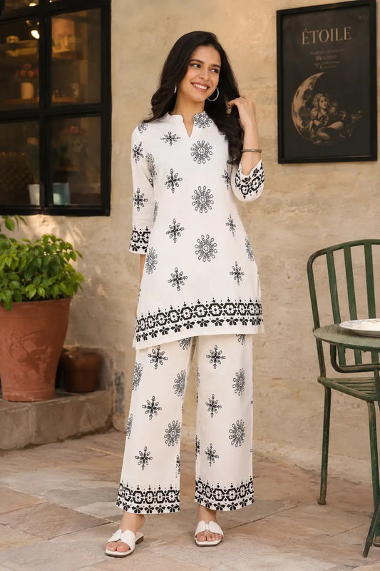 Rabric white and black Vertican Silk floral printed women co-ord set front view with straight kurti and wide leg pants for stylish casual wear