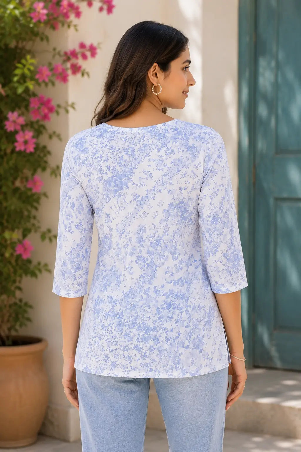 Back view of Rabric white blue floral cotton short top for women with 3/4 sleeves and straight fit casual wear