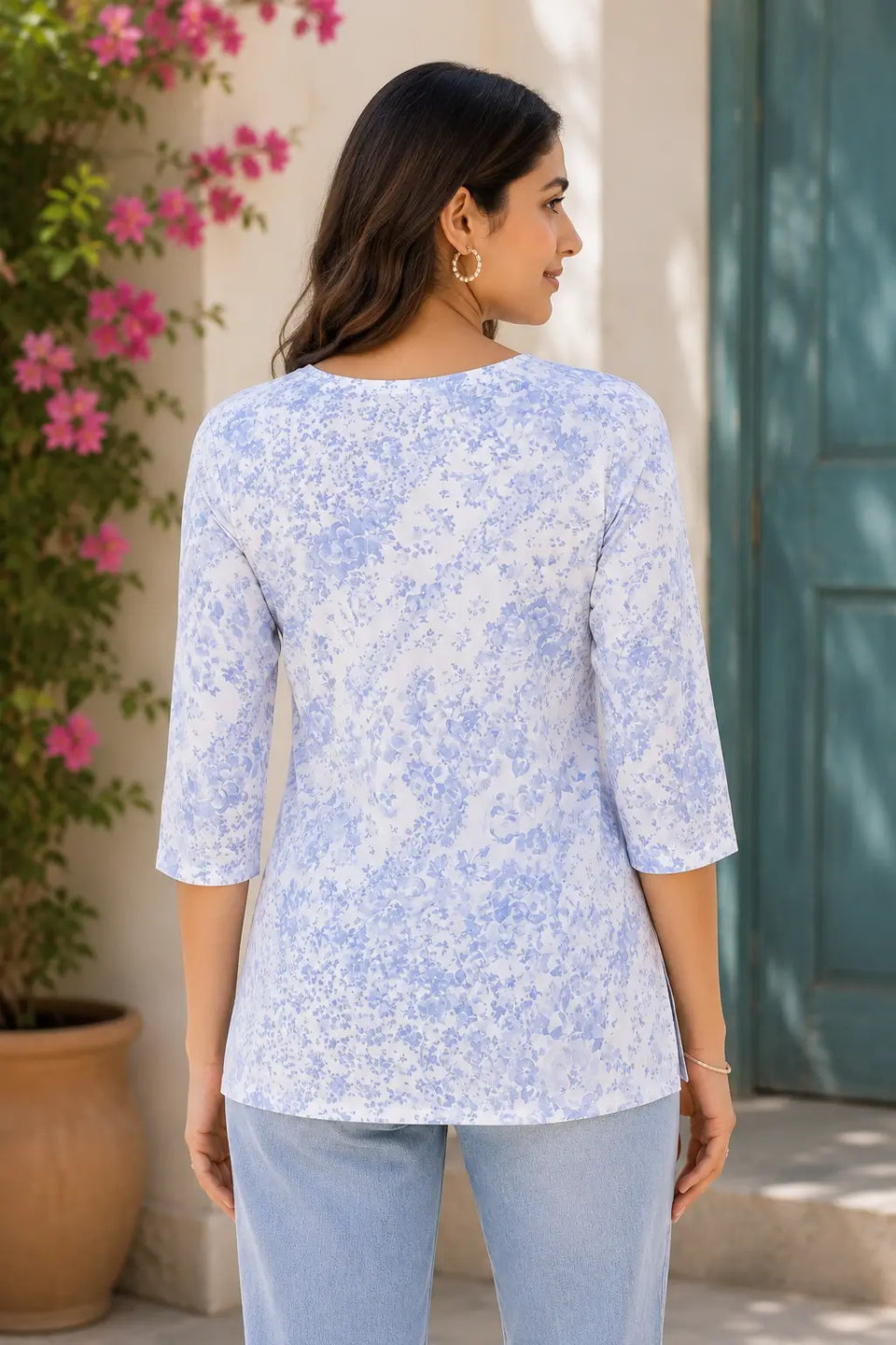 Back view of Rabric white blue floral cotton short top for women with 3/4 sleeves and straight fit casual wear