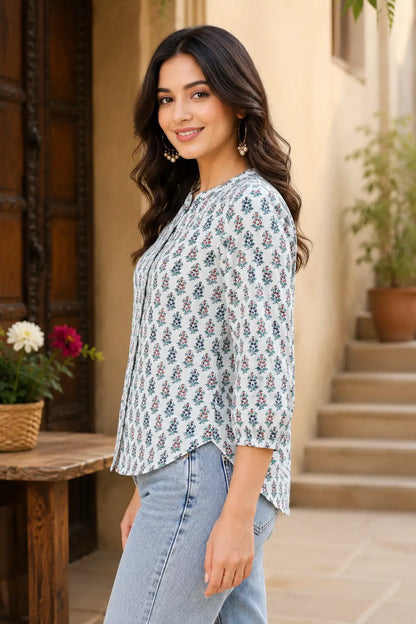 Side angle view of Rabric white floral cotton shirt style short top for women with relaxed casual fit